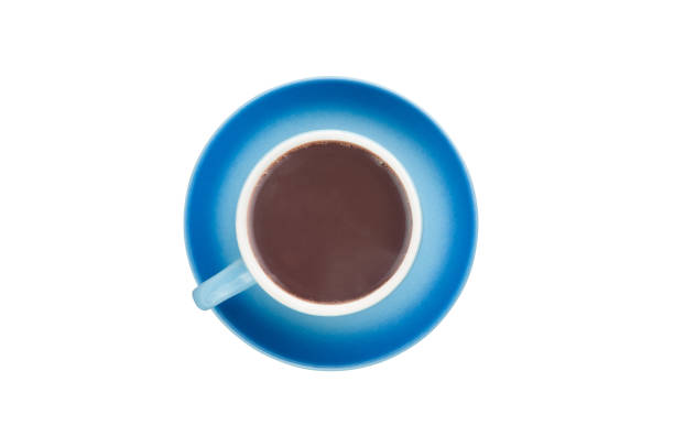 Single blue ceramic cup with handle full of hot fresh liquid chocolate on circle saucer isolated on white background. Top view. Clipping path