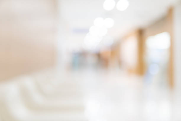 istock Abstract blur luxury hospital corridor. Blur clinic interior background with defocused effect. Healthcare and medical concept 1149576059