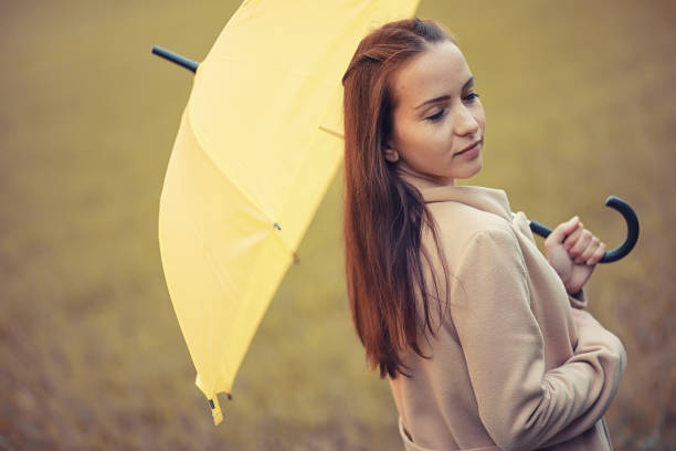 istock Young girl in autumn park 1149577401