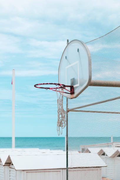 istock Beach playground, old basketball board 1149579011