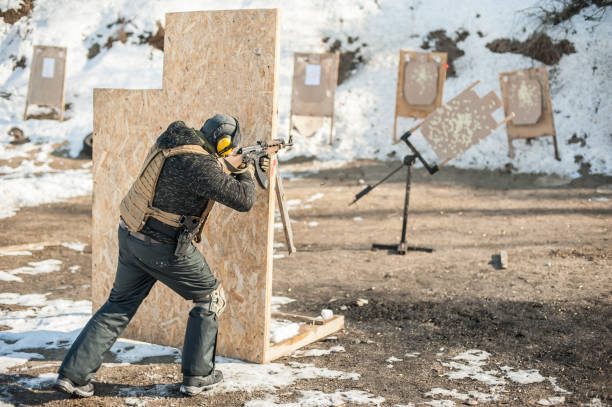 istock Military soldier shooting from rifle machine gun on moving target 1149579941