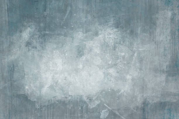 istock Blue distressed wall grungy background with spotlight background 1149583313