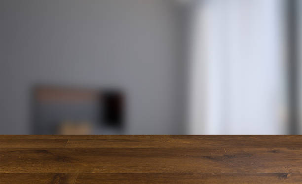 istock Empty interior with a fireplace on the background of wooden walls. Large panoramic window on the background of the city. 3D rendering. wooden table 1149583353