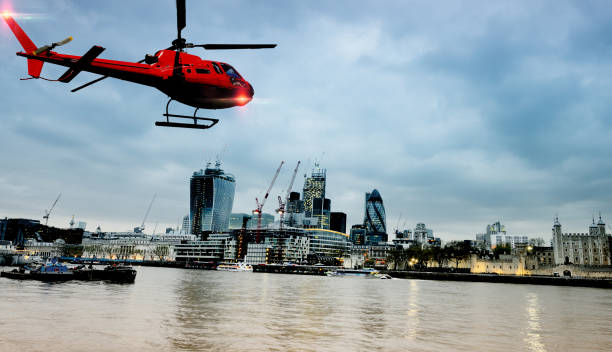 istock Helicopter Flying over Thames River, London, UK. 1149586502