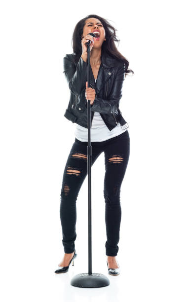 istock Bautiful woman wearing a leather jacket and singing like a rock star 1149586859