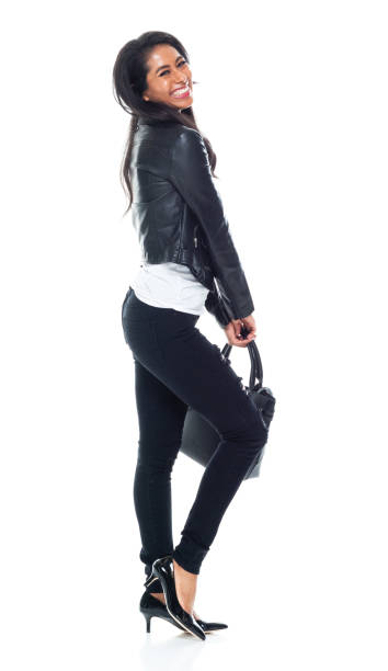 istock Bautiful woman wearing a leather jacket and holding a purse 1149586952