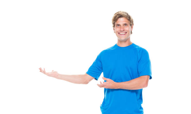 istock Handsome man in sports clothing presenting 1149587144