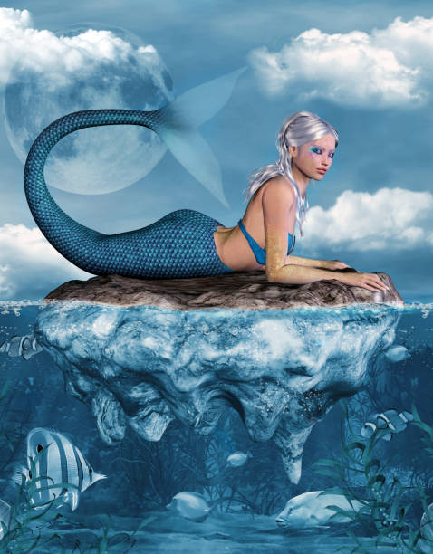 istock Beautiful mermaid relaxing on a reef 1149588656
