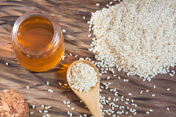 istock Sesame seeds and oil. Top view - Sesamum indicum 1149591214