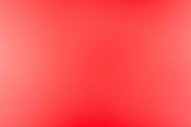 istock Real texture in a bright, red color illuminated with a delicate light. 1149593707