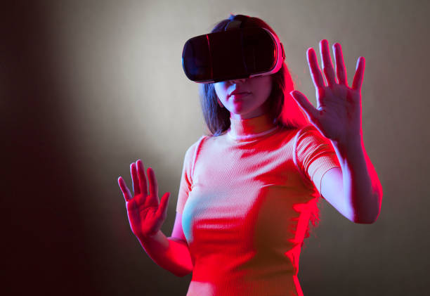 istock Young girl with VR goggles on head 1149593728