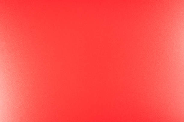 istock Real texture in a bright, red color illuminated with a delicate light. 1149593770
