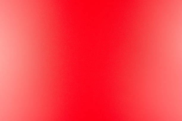 istock Real texture in a bright, red color illuminated with a delicate light. 1149593771