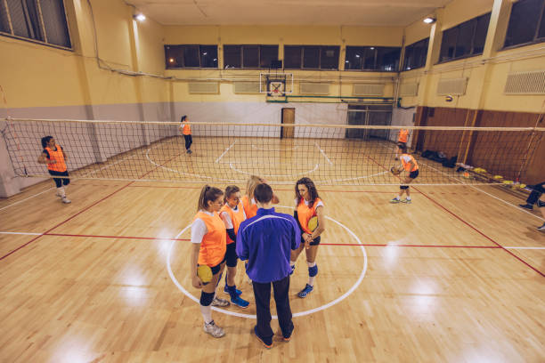 istock Coach talking to a volleyball players 1149598534