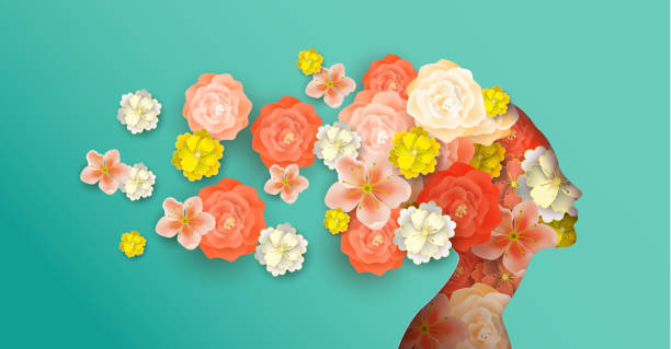istock Papercut woman head with spring flowers 1149605478