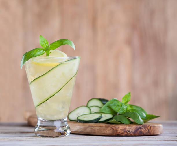 Basil Cumber Cocktail fresh craft basil cucumber lemonade cocktail lime basil plant stock pictures, royalty-free photos & images