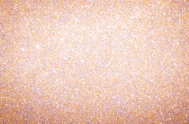 розовое золото блеск фоновой текстуры - glitter defocused illuminated textured effect стоковые фото и изображения