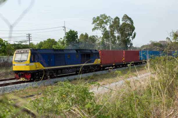 istock High Speed Electric train. Cargo train platform with freight train container at depot in port use for export logistics background. 1149616120