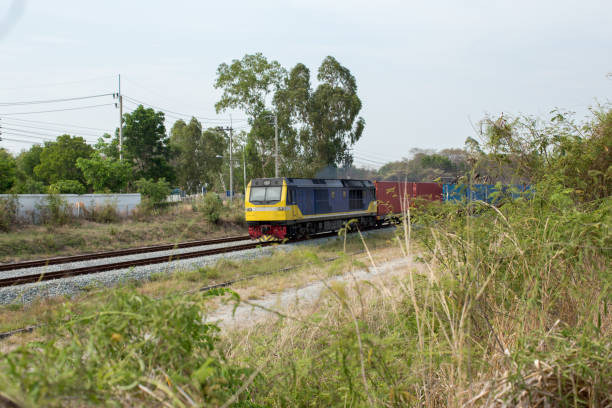 istock High Speed Electric train. Cargo train platform with freight train container at depot in port use for export logistics background. 1149616132