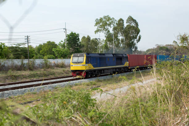 istock High Speed Electric train. Cargo train platform with freight train container at depot in port use for export logistics background. 1149616159