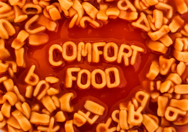 The words 'Comfort Food' spelt out using alphabet pasta shapes stock photo