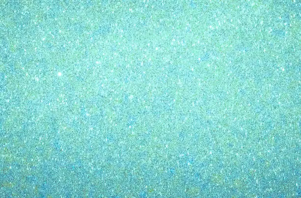 Photo of Light Blue turquoise color glitter texture abstract background .Texture of Blue paper