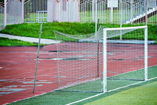 istock Football gate on the old empty field. 1149617946