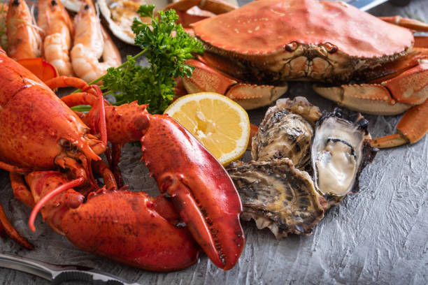 immagine di pesce assortiti - prepared shellfish foto e immagini stock