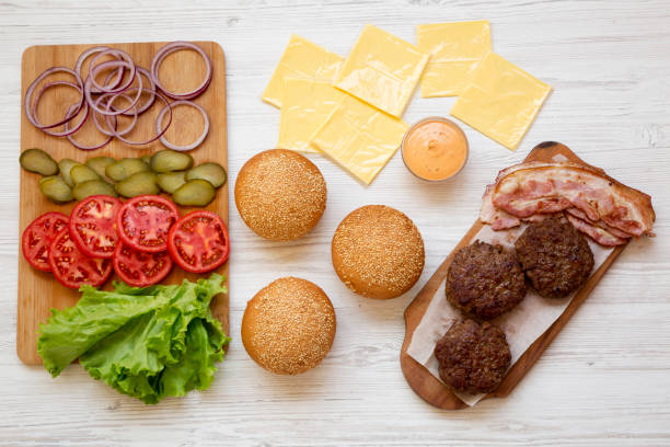 istock Cheeseburger ingredients, top view. From above, overhead, flat lay. Close-up. 1149622942