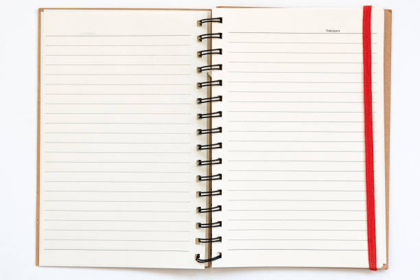 istock New open notepad for writing on white background. Red bookmark on blank empty page. The concept of study, planning. 1149624300