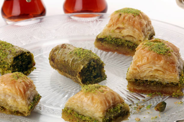istock Middle eastern or arabic dishes. Turkish Dessert Baklava with pistachio on dishes 1149626657