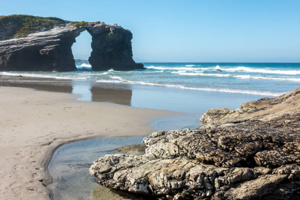 istock Stunning rock formations at the famous beach Playa de Las Catedrales 1149628582