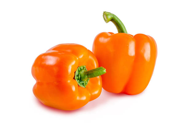 istock tomato orange pepper on the board isolated background 1149629755