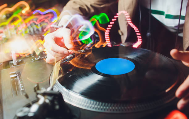 istock a vinyl record on the panel of the DJ. DJ equipment. 1149637353