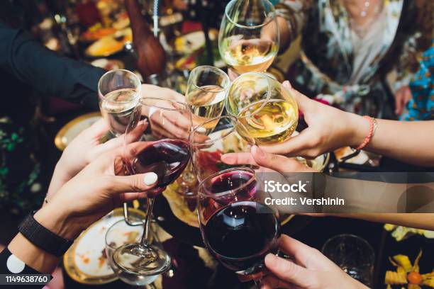 Champagne Glasses In Hands Of People At Party Stock Photo - Download Image Now - Celebratory Toast, Drinking, Friendship
