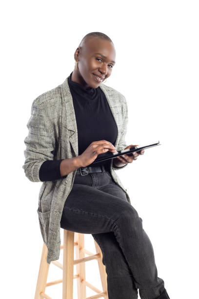 istock Teacher or Businesswoman Preparing Lessons with a Tablet 1149643765