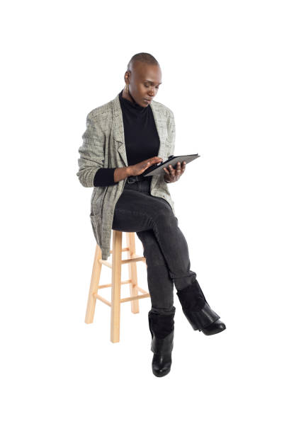 istock Teacher or Businesswoman Preparing Lessons with a Tablet 1149643767