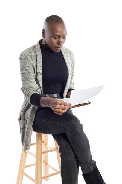 istock Businesswoman with Contracts or Teacher Preparing Lesson 1149643932