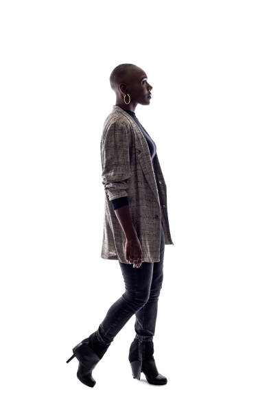 istock Black Female Model on a White Background Walking 1149643951
