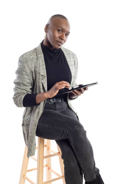 istock Teacher or Businesswoman Preparing Lessons with a Tablet 1149643966