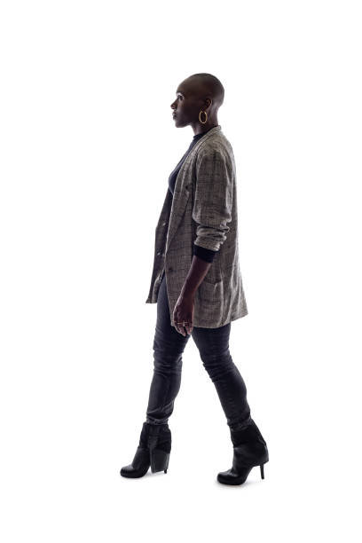 istock Black Female Model on a White Background Walking 1149644005