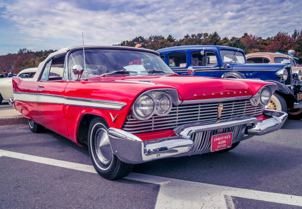 1957 Plymouth convertible with roof top up Bedford, Nova Scotia, Canada - September 20, 2009 : 1957 Plymouth convertible at Memory Lane Car Show, Superstore parking lot, Bedford, Nova Scotia.lens 2009 stock pictures, royalty-free photos & images