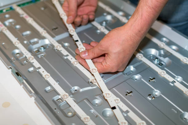 istock LCD TV repair, disassembly and replacement of LED backlight. 1149659906