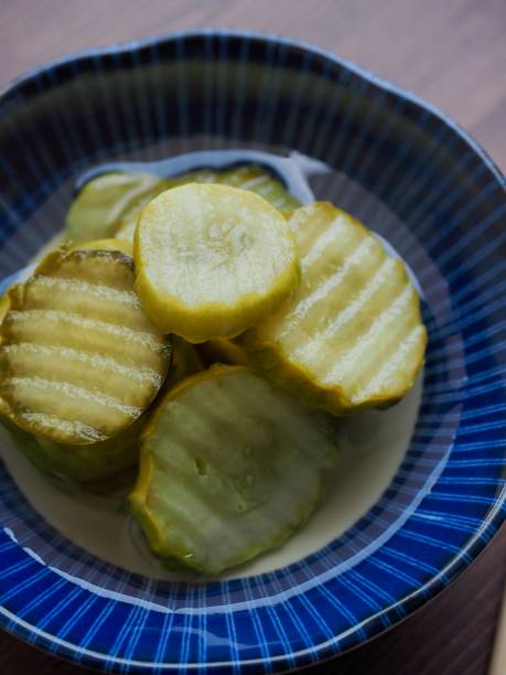 istock side dish Cucumber pickle and chopsticks 1149665142