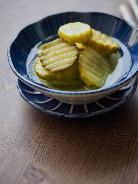 istock side dish Cucumber pickle and chopsticks 1149665163
