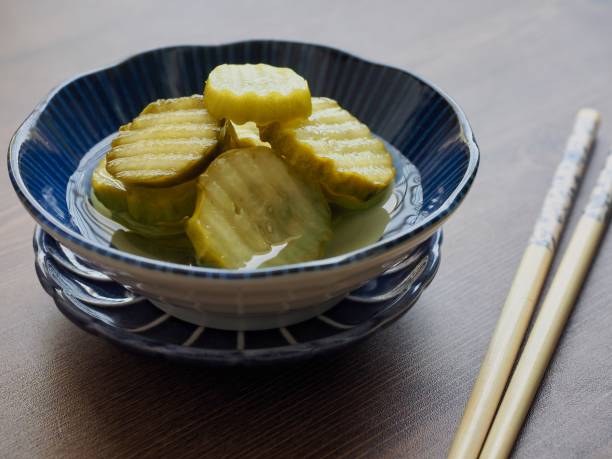istock side dish Cucumber pickle and chopsticks 1149665188