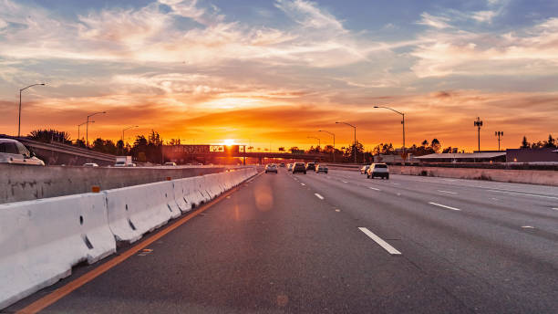 istock Colorful sunset while driving on a freeway in South San Francisco bay area, California 1149675557