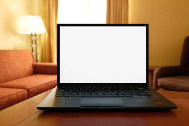 istock Laptop computer on desk in cozy hotel room 1149683533