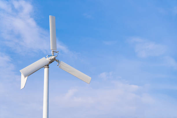 istock Wind turbine with blue sky background 1149685523