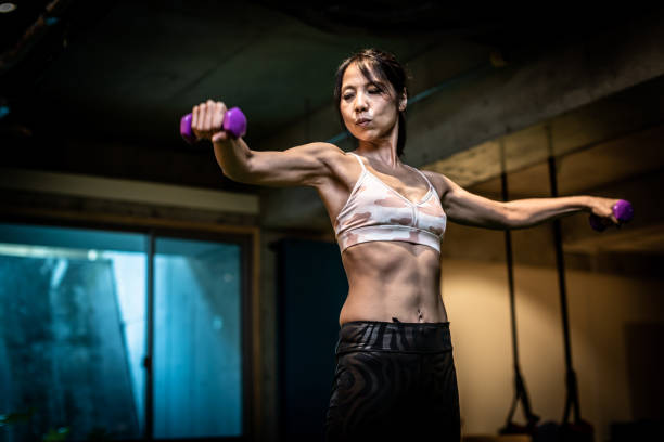 istock Japanese women doing weight training at the gym 1149686711